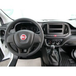 Näide auto Fiat Doblò / Opel Combo originaalraadio ja armatuurlaua fotost sobivuse kontrollimiseks